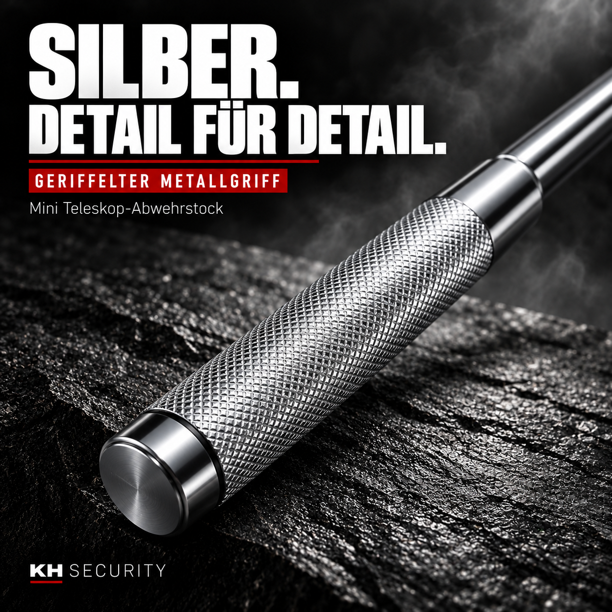 Mini Teleskop Abwehrstock in Silber – Detailaufnahme des geriffelten Metallgriffs