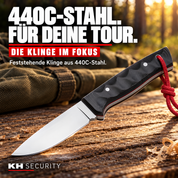 Outdoor Pro Messer – feststehende Klinge aus 440C-Stahl auf einem Camping-Arbeitstisch