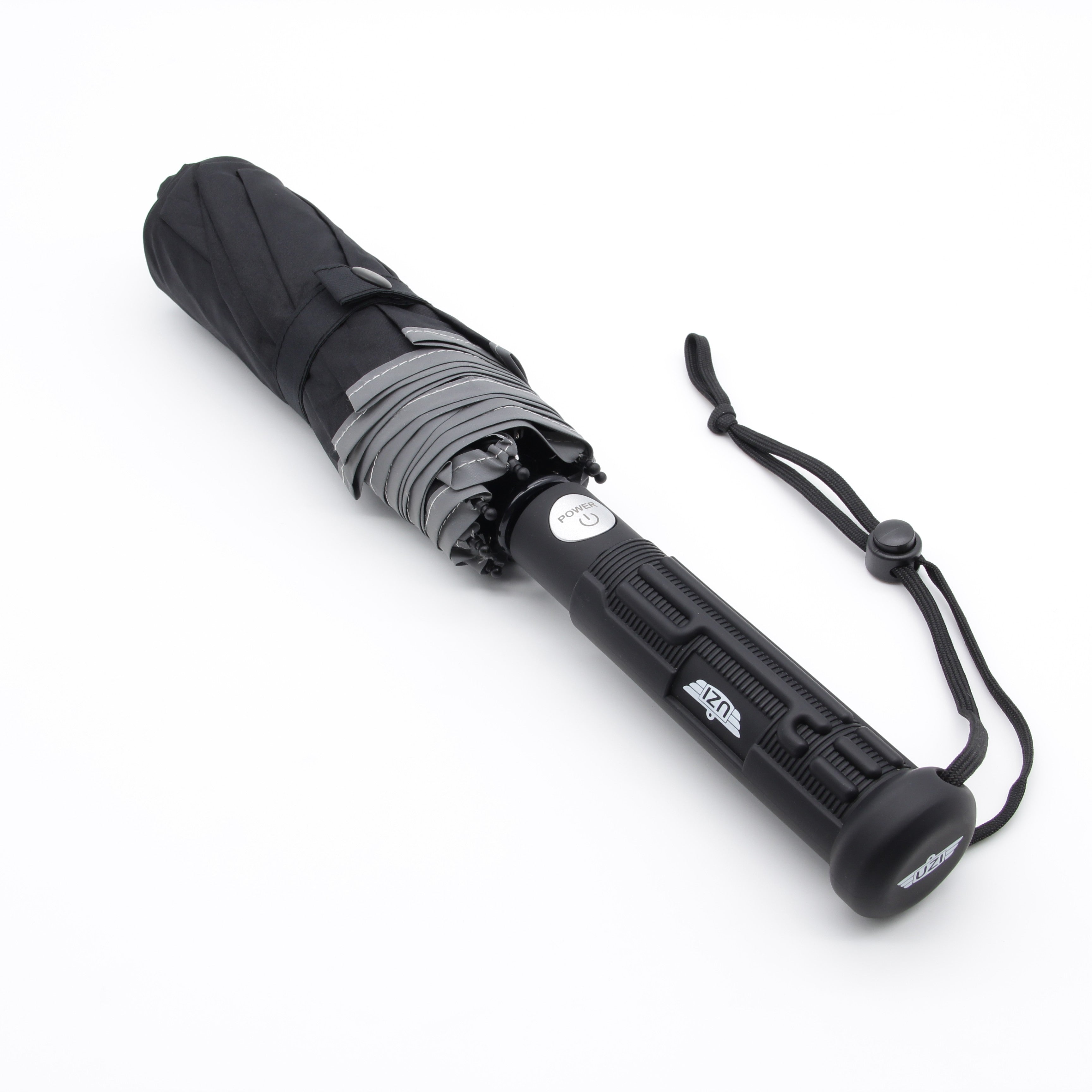 Originalfoto des UZI Sicherheitsschirms mini 310359 mit Handschlaufe, Griffprofil und Verschlussband
